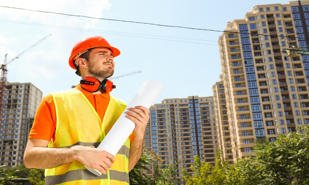 young man civil engineer in safety hat